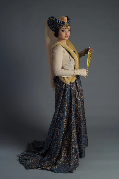 Beautiful young girl in a historical dress Stock Image