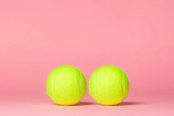 Dva Žluté Tenisové Míčky Růžovém Pozadí Rozumím Koncept Zdraví Potence — Stock fotografie