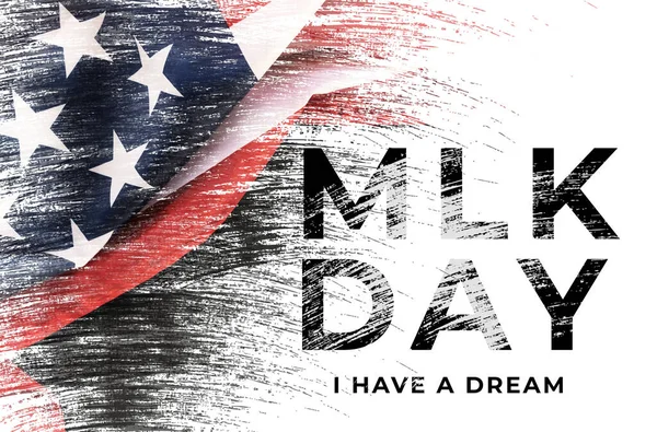 Painted American Flag with black abbreviation MLK. Happy Martin Luther King Day concept. Web banner.