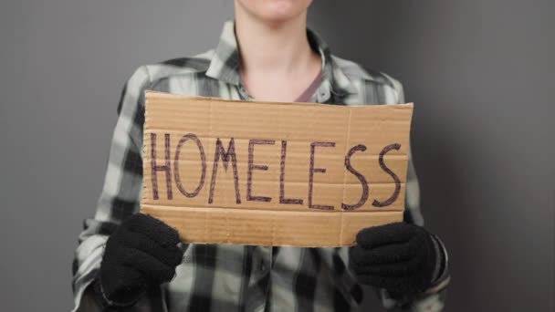 Untidy Beggar Woman Holds Cardboard Sign Inscription Homeless Dark Background — Stok video