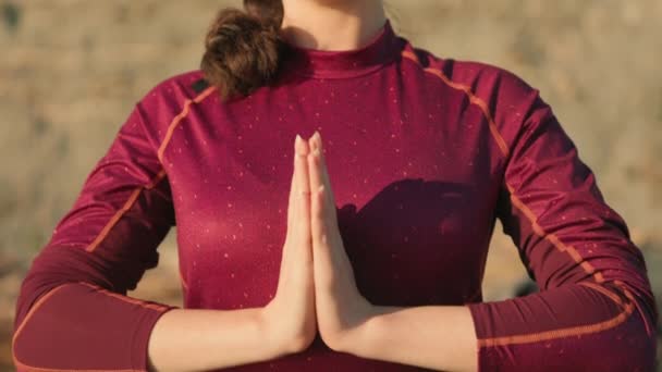 Portrait Woman Meditates Her Palms Folded Namaste Gesture Tilt Background — Stock Video