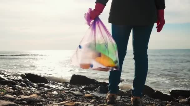 Female Volunteer Stands Oceans Coast Holds Garbage Bag Plastic Bottles — Stock Video