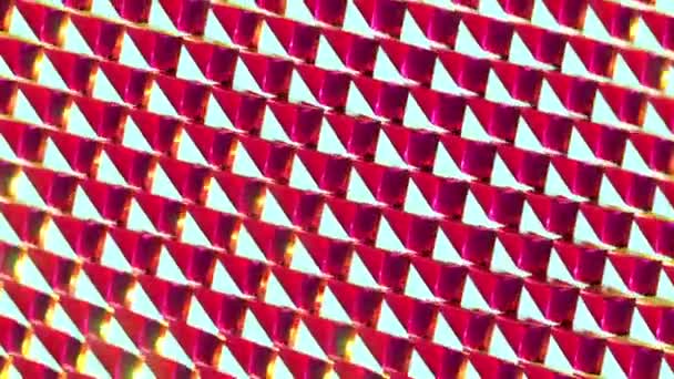 ガラス製の輝くピンクの三角形が同期して動きます アニメーションの背景をループさせ — ストック動画