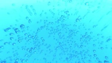 Titreşen suyun üst görüntüsü, kameranın dairesel hareketi. döngü arkaplanı