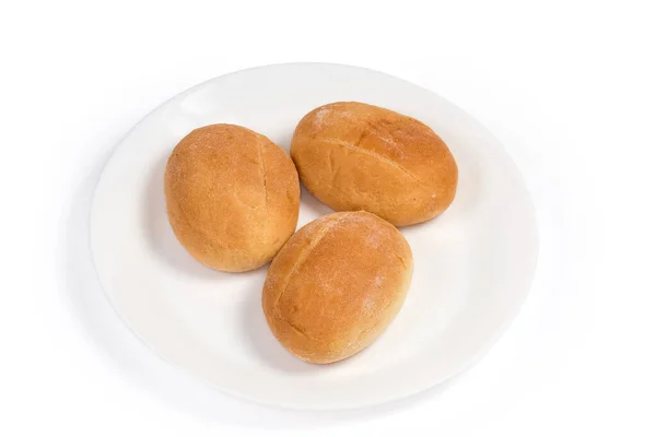 Drei Kleine Runde Leicht Längliche Brötchen Auf Dem Weißen Teller — Stockfoto