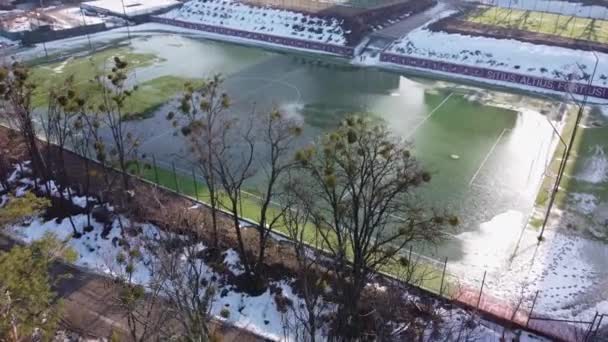 Soccer Field Covered Water Melting Snow Aerial View — Stock Video