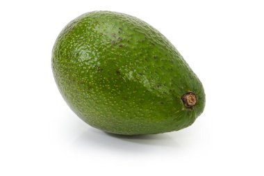 Single whole pear-shaped avocado fruits with green skin on a white background