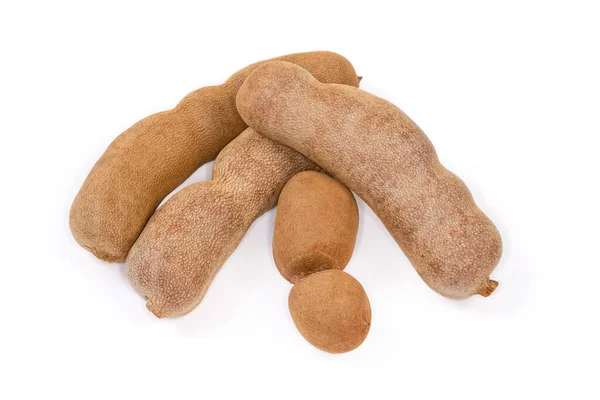 Vários Frutos Tamarindo Maduros Secos Forma Vagem Suas Conchas Fundo — Fotografia de Stock