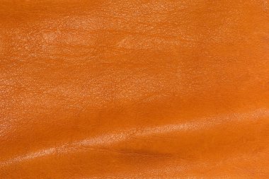 Orijinal deri dokusu, sarı kahverengi aksesuar parçası, hafif katlanmış, arka plan