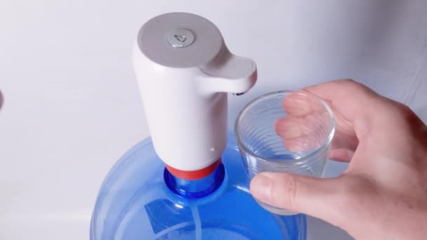 Water Pouring Glass Carboy Using Electric Pump — Stock Video