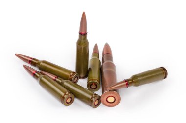Service rifle cartridges of the different caliber on a white background close-up