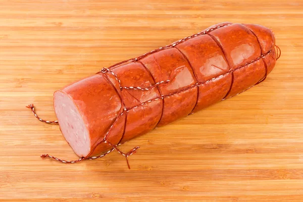 Partly Cut Thick Boiled Smoked Sausage Tied Twine Wooden Cutting — Stock Photo, Image