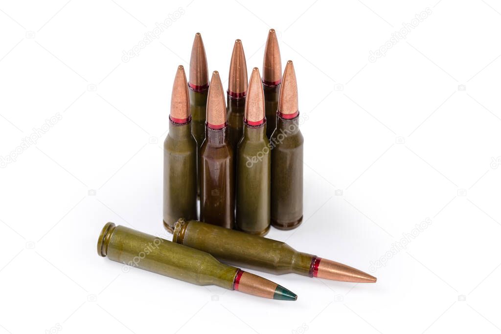 Different service cartridges for assault rifle on a white background, close-up in selective focus