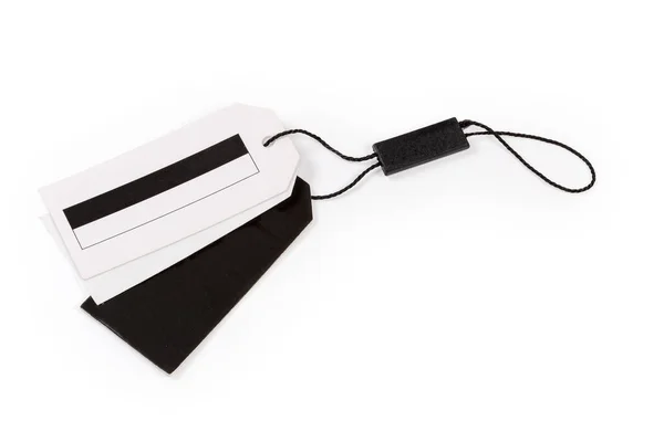 Kleiderschaukelanhänger Form Mehrerer Leerer Weißer Und Schwarzer Kartonblätter Auf Einem — Stockfoto