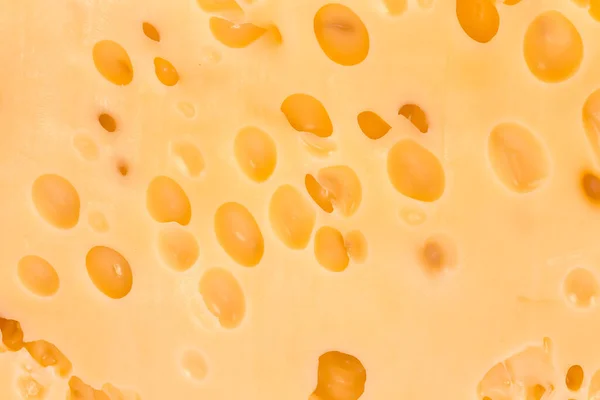 Sviçre Tipi Peynirin Bir Bölümdeki Dokusunun Görünümü Yakın Plan Arka — Stok fotoğraf