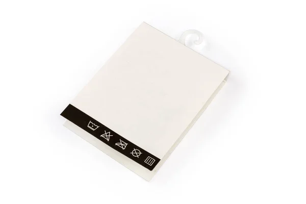Folded Blank White Carton Hanging Tag Clothing Care Symbols Plastic — Foto de Stock