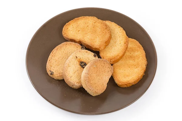 Rusks Two Varieties One Which Addition Raisins Brown Dish White — стоковое фото