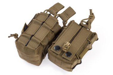 Two textile military tactical pouches for cartridge magazines for fasten to combat unloading vest or bulletproof vest on a white background
