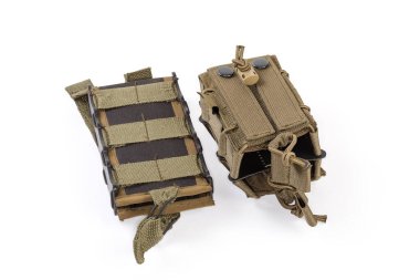 Two different textile military tactical pouches for one and two cartridge magazines for fasten to combat unloading vest or bulletproof vest on a white background