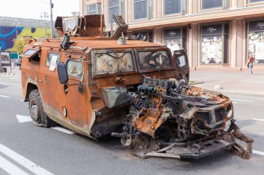 Kyiv, Ukraine - August 22, 2022: Exposition of Russian military equipment destroyed in Russian invasion of Ukraine, wrecked and burnt rusty armoured combat vehicle