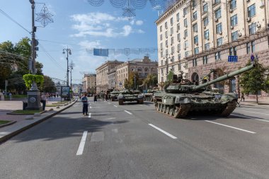Kyiv, Ukraine - August 22, 2022: Exposition of Russian military equipment destroyed during hostilities in Russian invasion of Ukraine, general view on a background of the different buildings