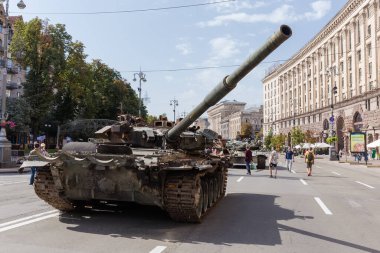 Kyiv, Ukraine - August 22, 2022: Exposition of Russian military equipment destroyed during hostilities in Russian invasion of Ukraine, wrecked battle tank