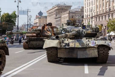 Kyiv, Ukraine - August 22, 2022: Exposition of Russian military equipment destroyed during hostilities in Russian invasion of Ukraine, wrecked battle tanks and self-propelled howitzer