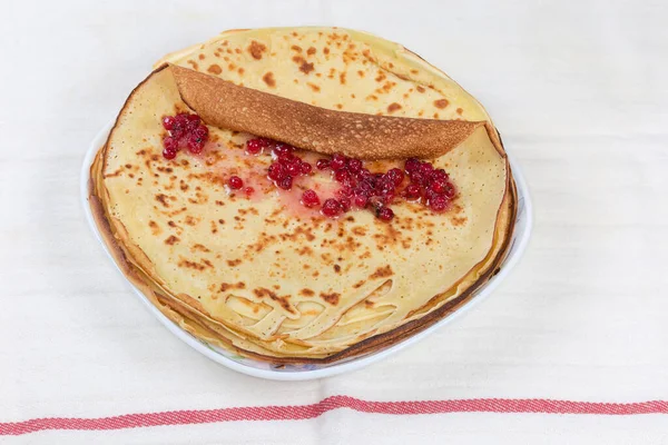 Stack Thin Flat Pancakes Top One Which Roll Roll Red — Foto de Stock