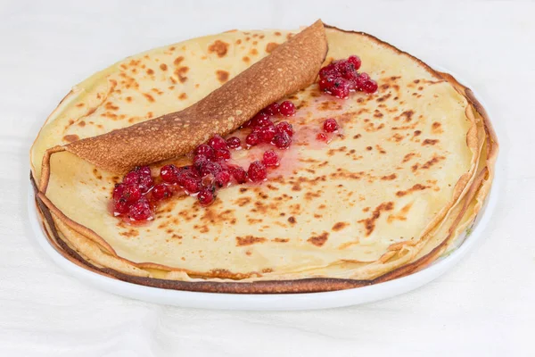 Stack Thin Flat Pancakes Top One Which Roll Roll Red — Stok fotoğraf