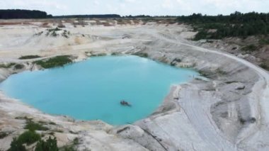 Quarry lake in abandoned kaolin pit, aerial view