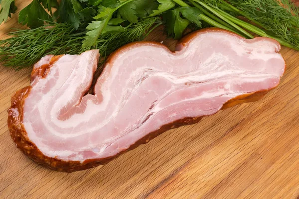 Piece Boiled Smoked Pork Belly Skin Fresh Greens Wooden Surface — Stockfoto