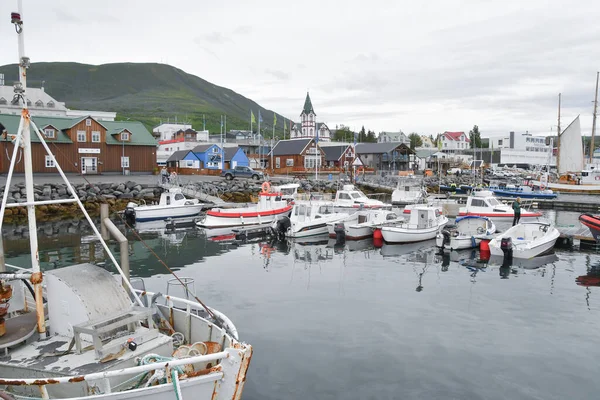 Port Moored Boats Village Church Husavik Mountains Backdrop Iceland Europe — Stockfoto
