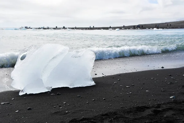 Small Block Icebergs Glacier Lake Has Reached Black Volcanic Sand Royalty Free Stock Photos