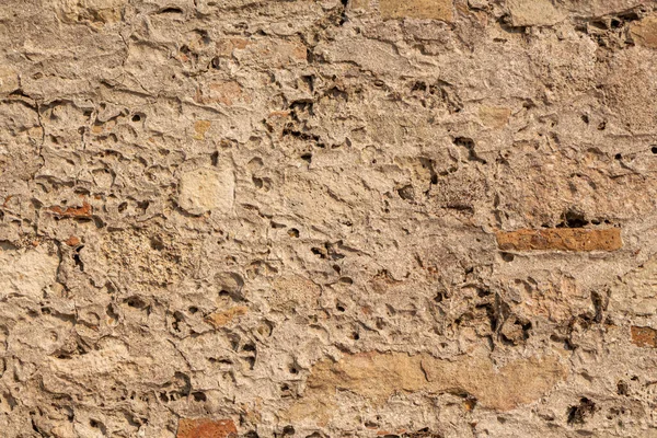 Una Hermosa Textura Una Vieja Pared Piedras Anaranjadas Con Grietas — Foto de Stock