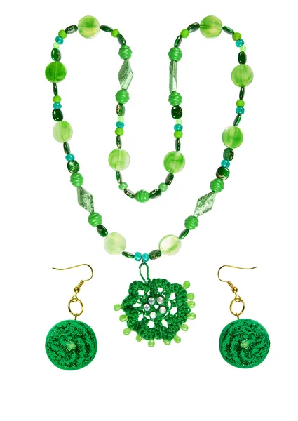 Beads and earrings from plastic, wood, yarn glass — Stock Photo, Image
