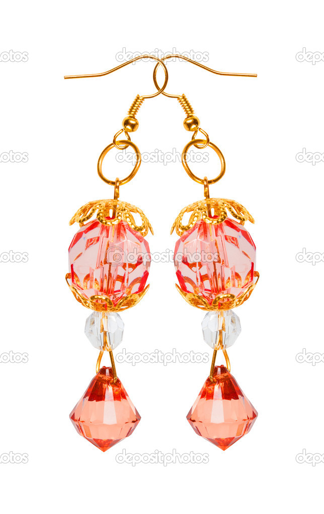 Earrings in red glass with gold elements. white background