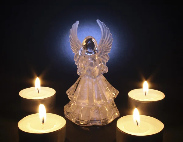 Angel with tea lights — Stock Photo, Image