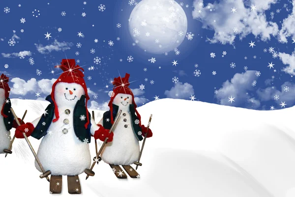 Christmas snowmen skiing — Stock Photo, Image