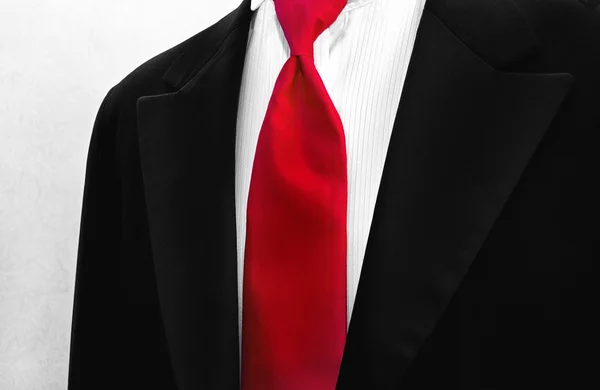 Bold red tie with tuxedo — Stock Photo, Image