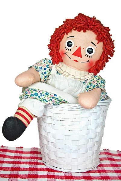 Old rag doll in basket — Stock Photo, Image