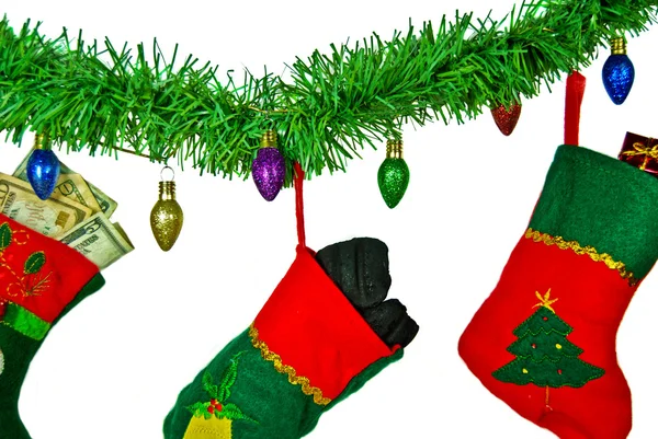Coal in Christmas stocking — Stock Photo, Image