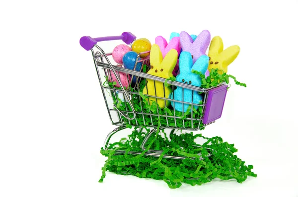 Easter bunnies in shopping cart — Stock Photo, Image