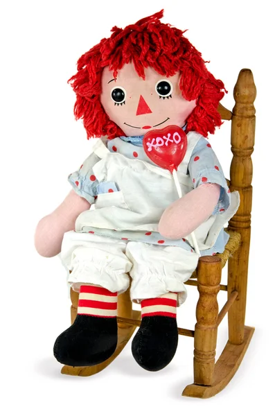 Rag doll with heart lollipop — Stock Photo, Image