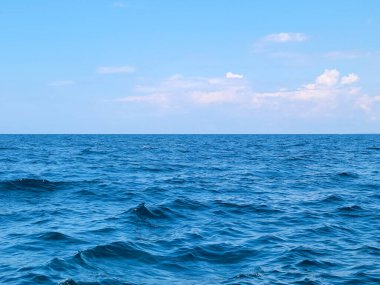 Horizon over blue Lake Michigan water with cloud pattern