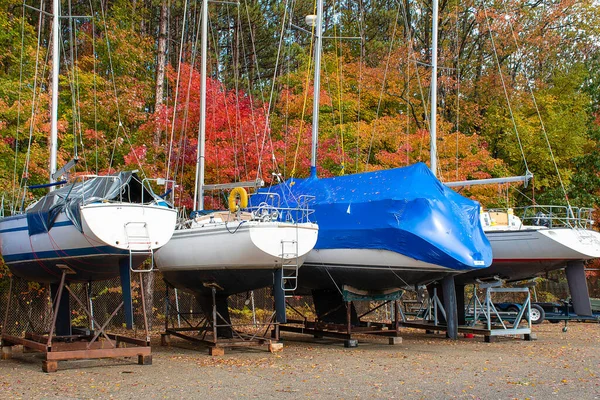 Sailboats Cradles Outdoor Storage Area Autumn Tree Foliage — Foto Stock