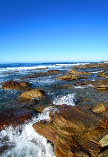 Stenig strand — Stockfoto