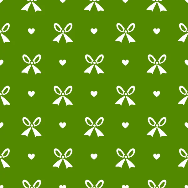 Seamless polka dot green pattern with bow and hearts. — Stock Vector