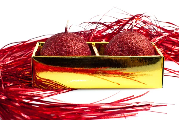 Rode kaarsen in een gouden vak — Stockfoto