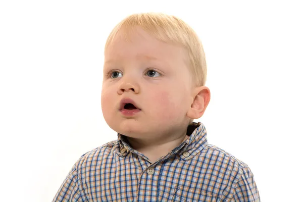Kleiner Junge auf weißem Hintergrund — Stockfoto