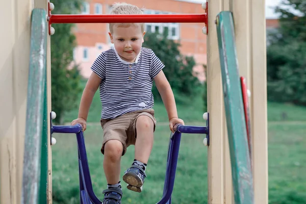 Small Boy Climbs Playhouse Public Playground Summer Time — Fotografia de Stock